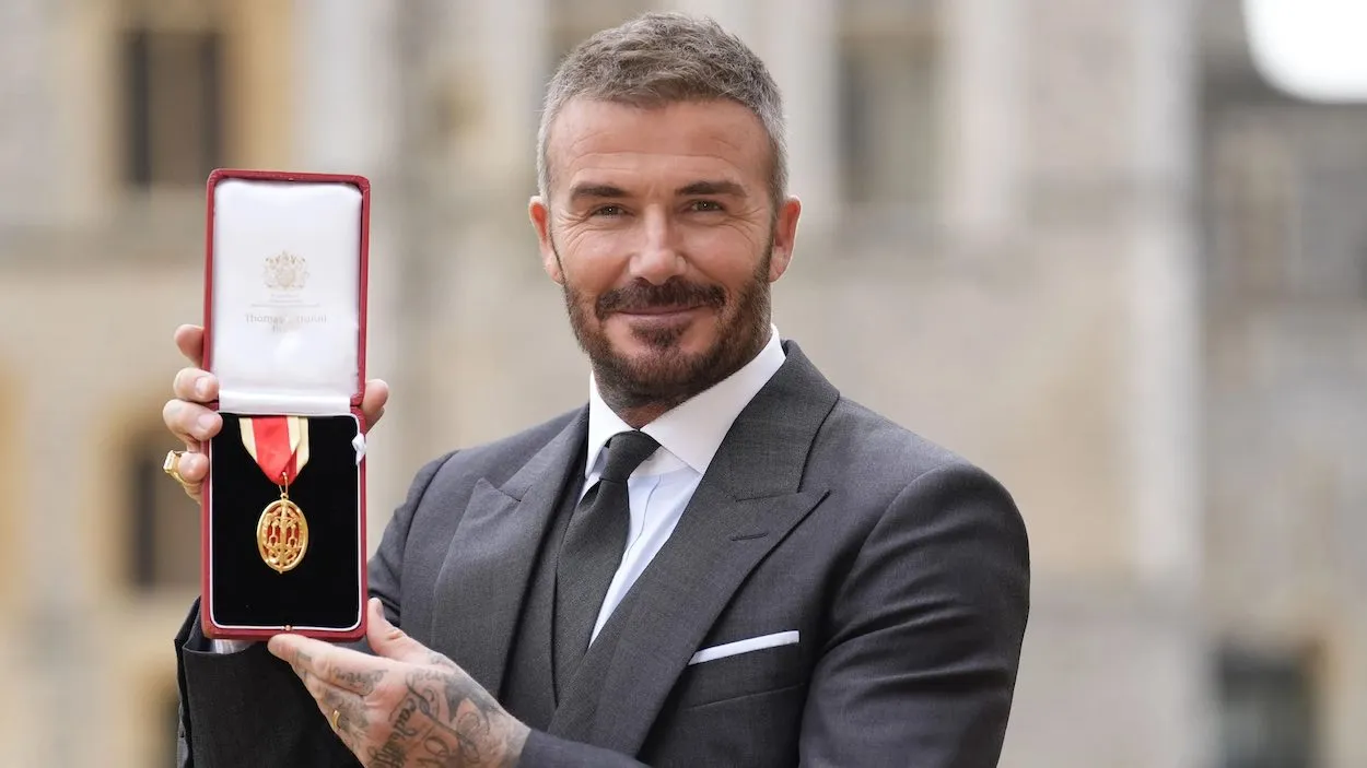 Sir David Beckham Knighted for Services to Sport and Charity